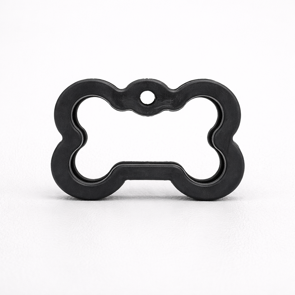 Bone Dog ID tag silencer on leather surface